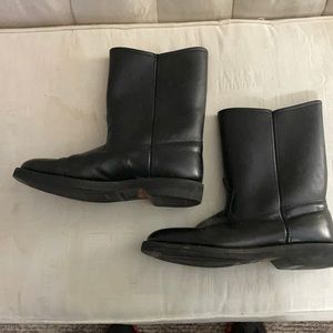 Black leather slip on boots. Size 10.5